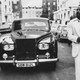 American soul singer Marvin Gaye (1939 - 1984) walking ahead of his Rolls Royce in Notting Hill, London.